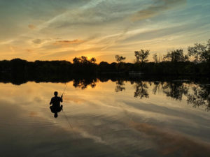 Man Fishing in Shady Oak Lake