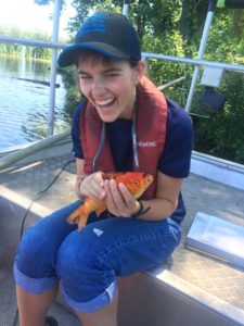 Lady holding a goldfish