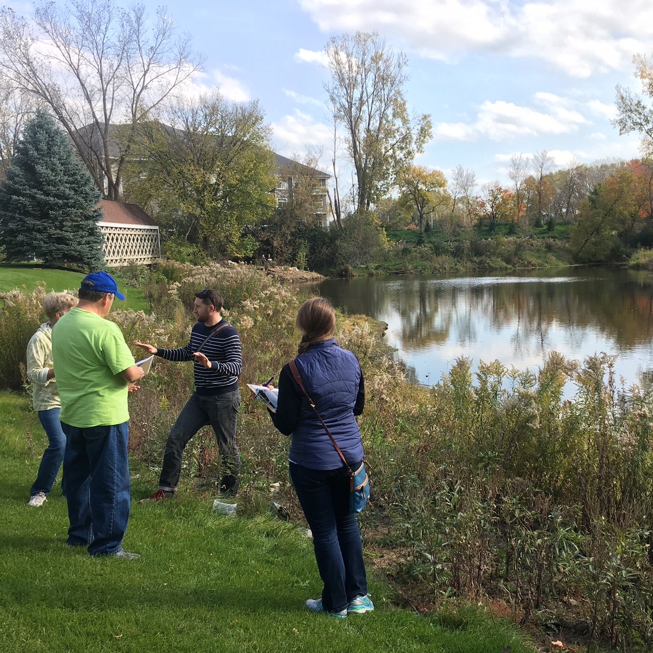 Planning grant recipients discuss project near lake