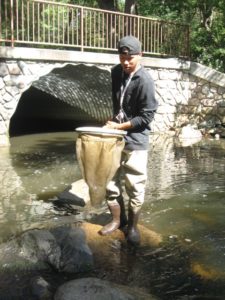A student participating in the Riverwatch Program.