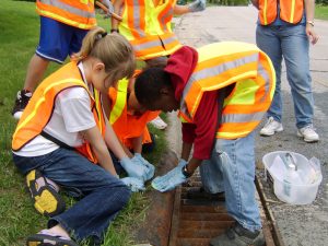 Girl Scout Troup Storm Drain Stenciling- Youth Program, Nine Mile Creek